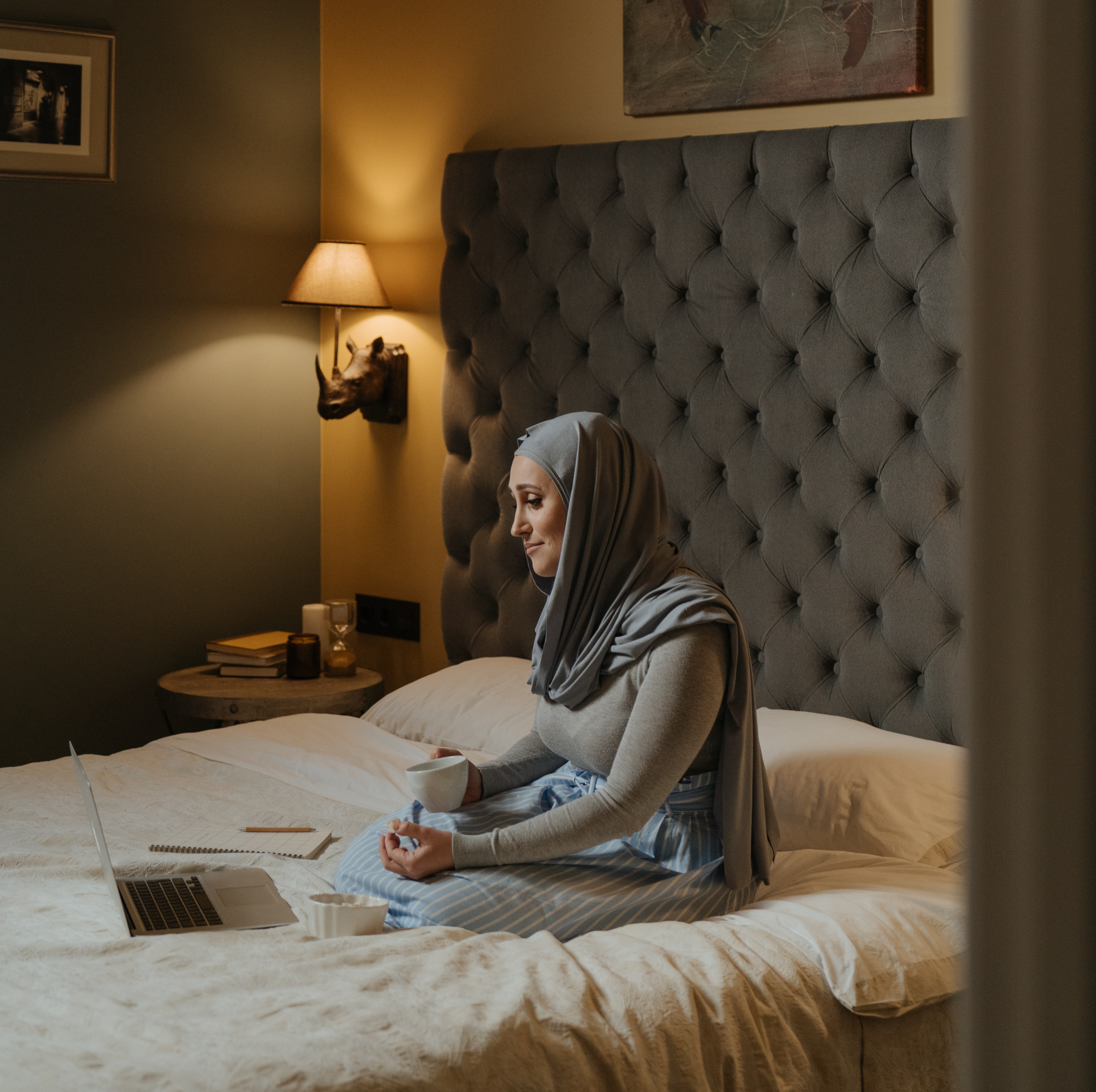 woman-in-gray-hijab-using-laptop-4626336